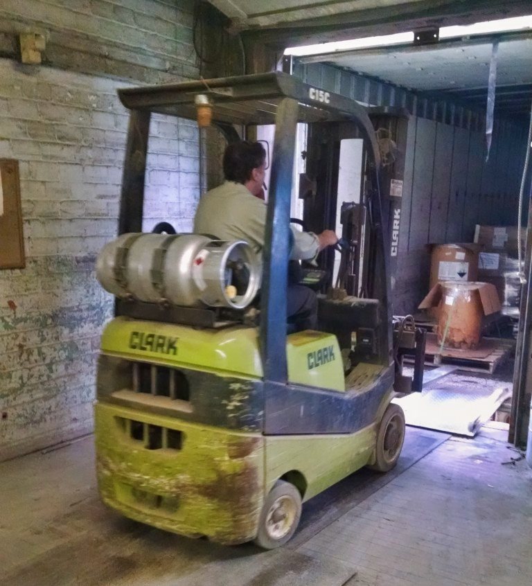 Loading dock at Parker Metal Finishing, forklift moving plated parts