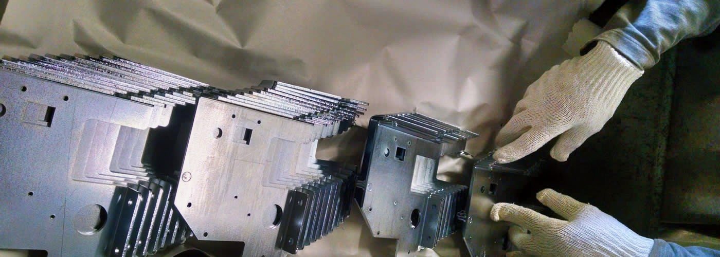 Zinc plated parts kraft wrapped for shipping at Parker Metal Finishing